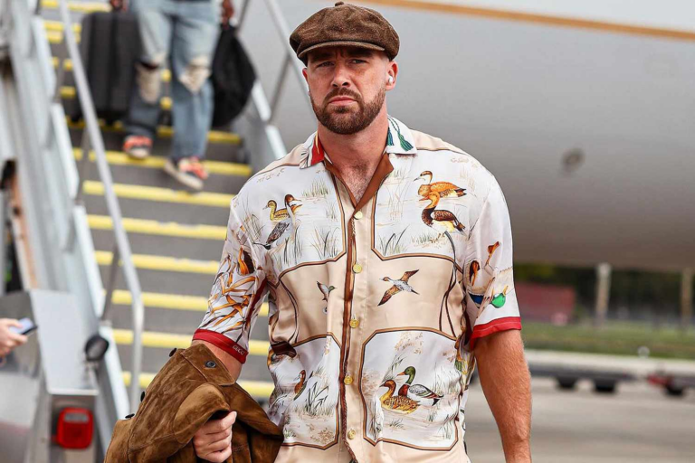 Travis Kelce Wears Wood-Inspired Outfit with Nod to Taylor Swift’s ‘Life of a Showgirl’