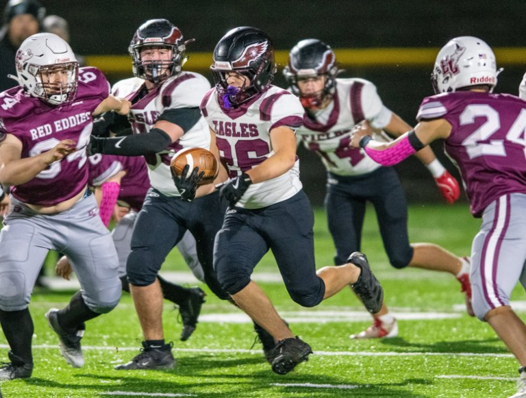 Windham football earns windy win over Edward Little