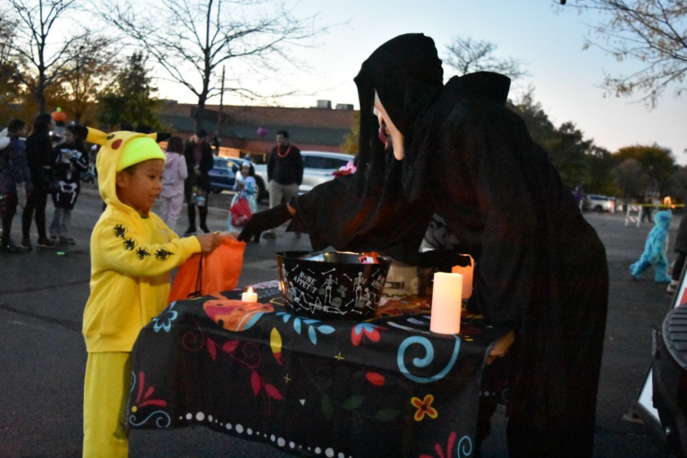 Halloween came early in Park Ridge as kids in costumes snagged candy from local business owners’ open trunks