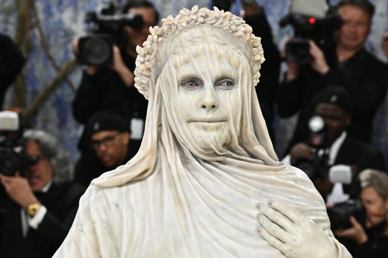 Photos: Met Gala guests take artistic liberties with dress code