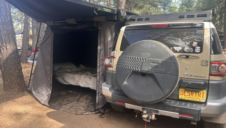 Toyota FJ with an awning room for New Mexico adventure dog Cookie Coley